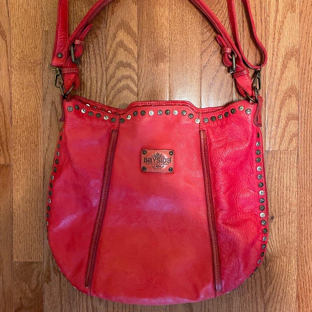 Red leather handbag with shoulder strap